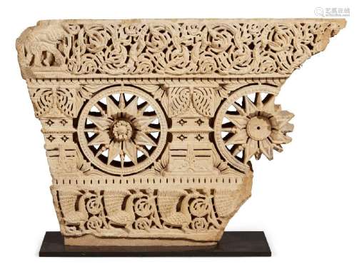 A deeply carved sandstone element from a balcony or a Jharok...