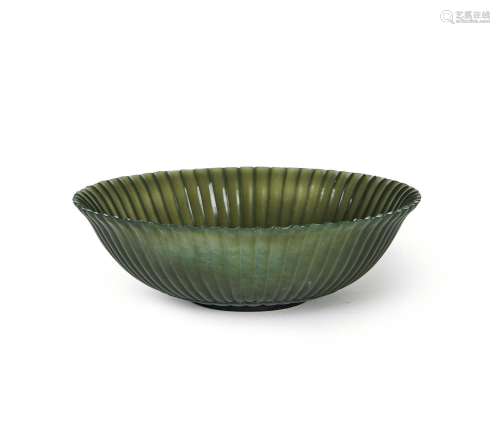 A CHINESE SPINACH JADE FOOTED CHRYSANTHEMUM SHAPED DISH, 18T...