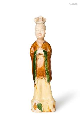 A LARGE SANCAI-GLAZED POTTERY FIGURE OF A STANDING OFFICIAL ...