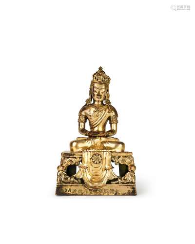 A SINO TIBETAN GILT BRONZE BUDDHA OF AMITAYUS, QIANLONG MARK...