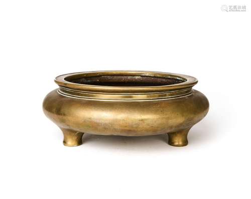 A CHINESE GILT BRONZE TRIPOD CENSER, 18TH CENTURY OR EARLIER...