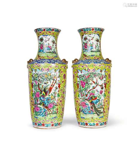 A PAIR OF CHINESE YELLOW GROUND FAMILLE ROSE VASES, QING DYN...