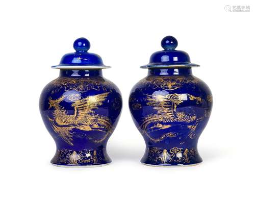 A PAIR OF CHINESE POWDER BLUE GROUND GILT DECORATED DRAGON &...