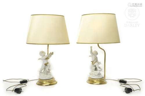 Pair of lamps with figures of little angels, 20th century