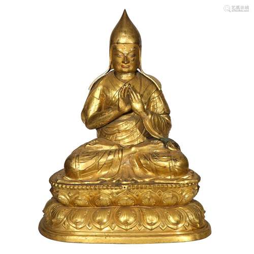 A GILT-BRONZE FIGURE OF TSONGKHAPA