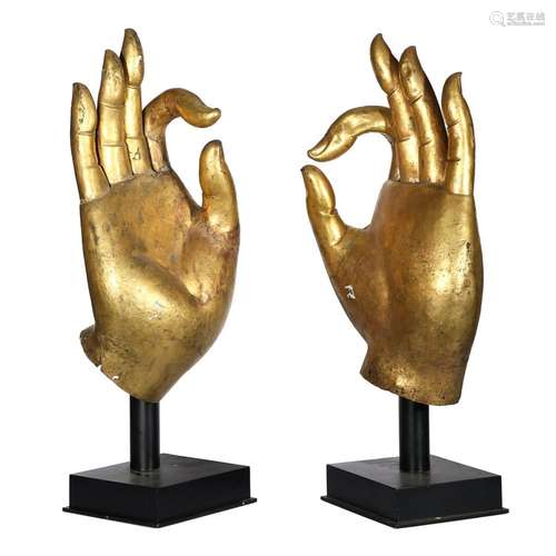 A PAIR OF GILT-BRONZE BUDDHA HANDS