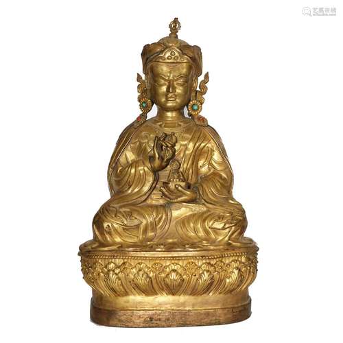 A GILT-BRONZE FIGURE OF A BUDDHA