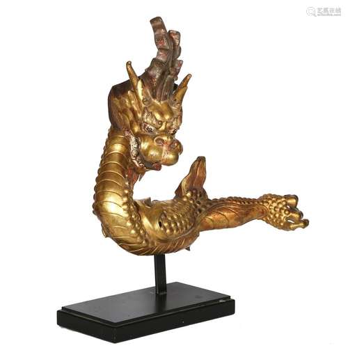 A GILT-BRONZE FIGURE OF A DRAGON