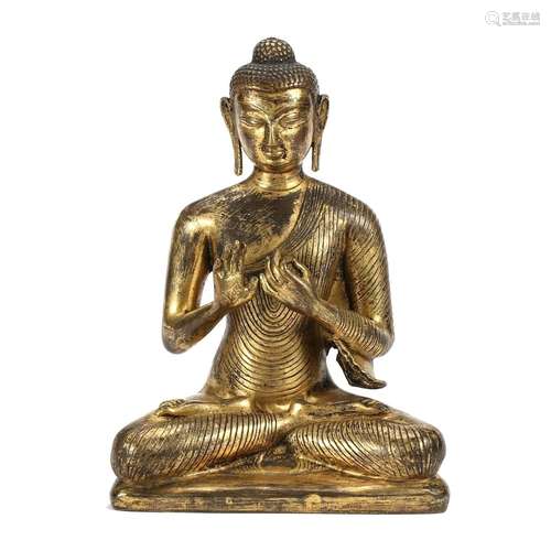 A GILT-BRONZE FIGURE OF SHAKYAMUNI