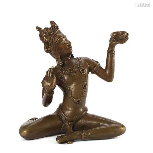 A BRONZE BUDDHA FIGURE