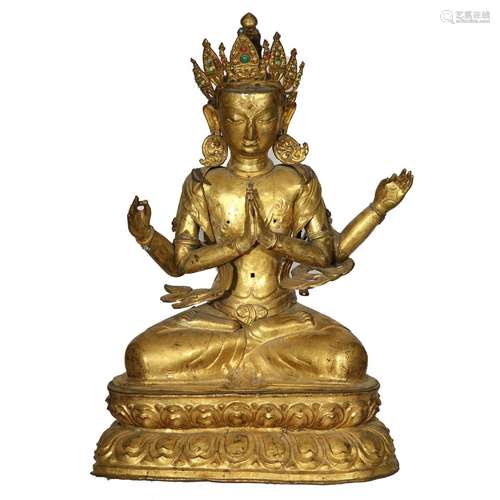 A GILT-BRONZE FIGURE OF A FOUR-ARMED BODHISATTVA