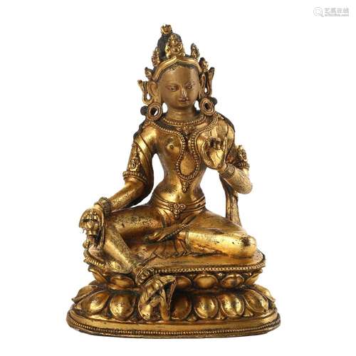 A GILT-BRONZE FIGURE OF A SEATED TARA