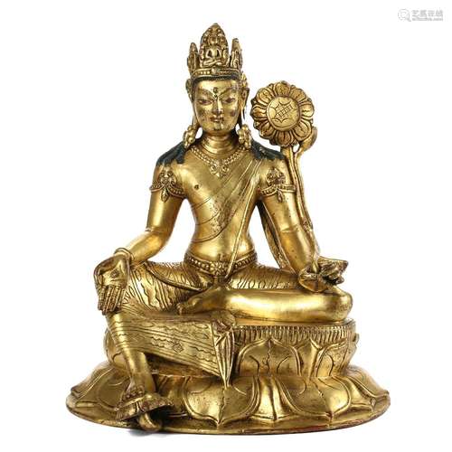 A GILT-BRONZE FIGURE OF A SEATED TARA