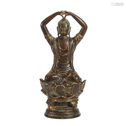 A GILT-BRONZE BUDDHA FIGURE