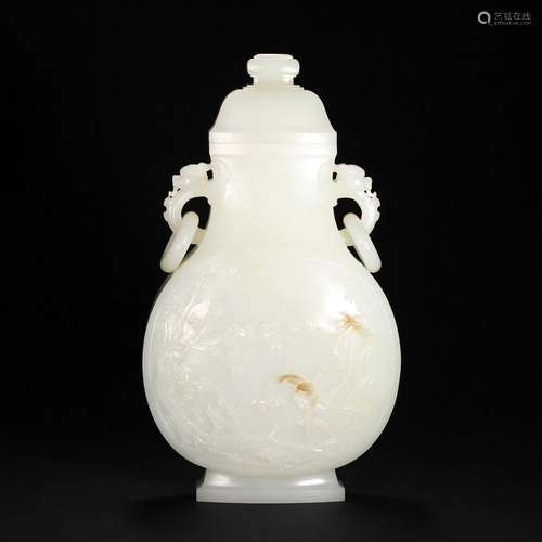 A WHITE JADE VASE