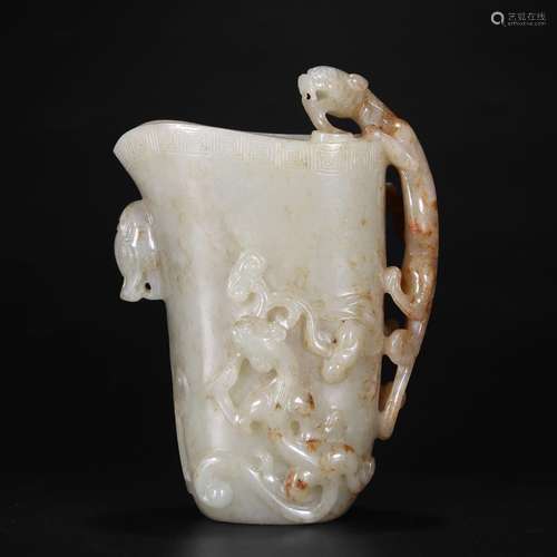 A WHITE JADE 'CHILONG' BEAKER CUP