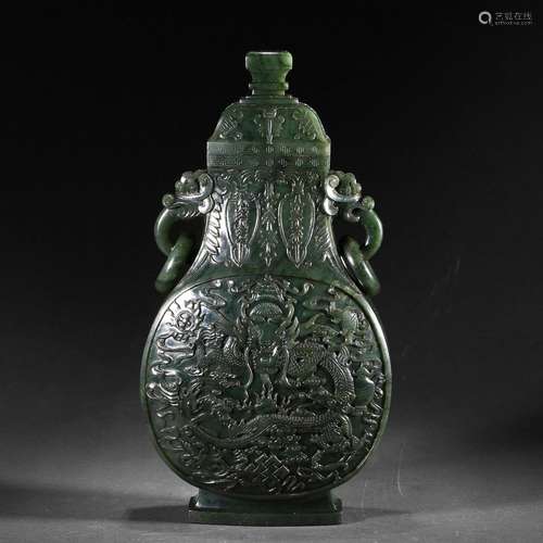 A SPINACH-GREEN JADE CARVED VASE