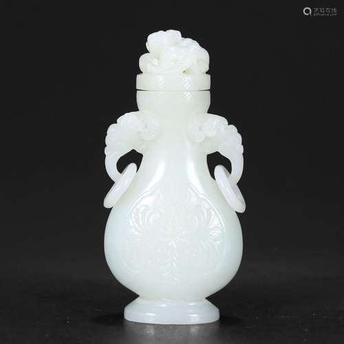 A WHITE JADE VASE