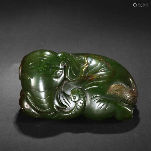 A SPINACH-GREEN JADE ELEPHANT