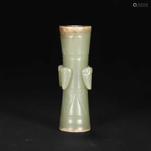 A CELADON JADE FEATHER HOLDER