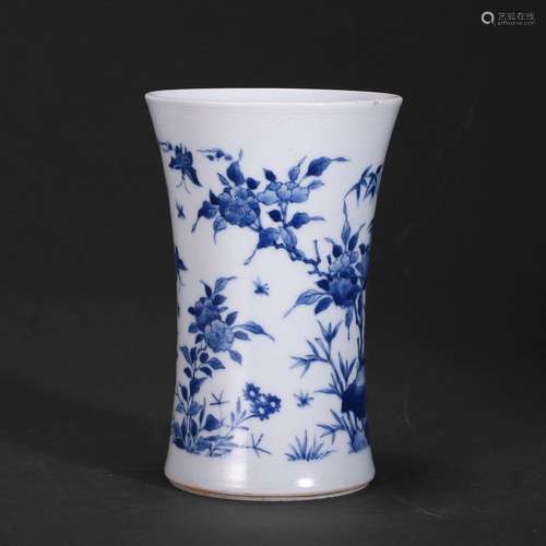 A BLUE AND WHITE FLORAL BRUSHPOT