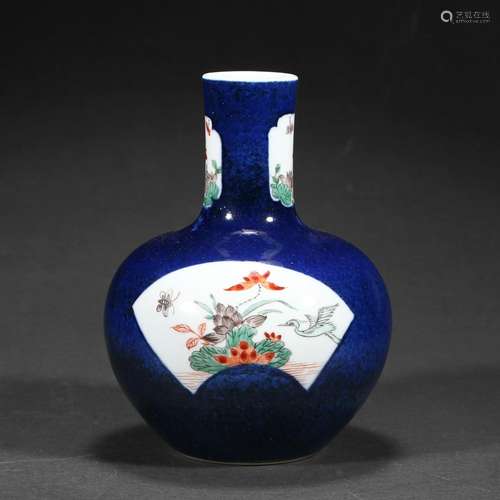 A BLUE-GLAZED FLORAL VASE