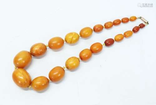 21 Chinese Butterscotch Amber Beads; 76G