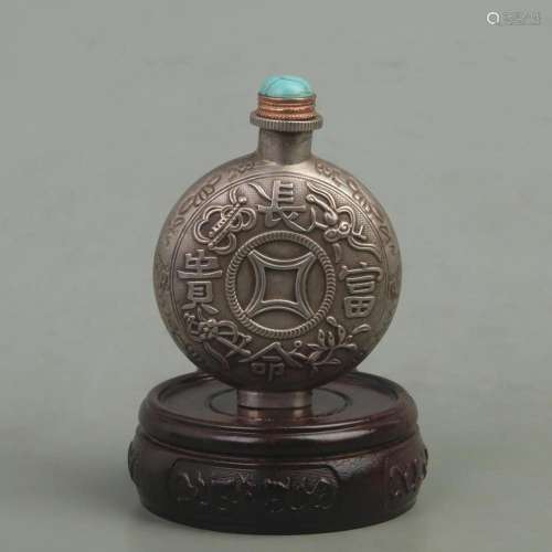A FINELY CARVED WHITE BRONZE SNUFF BOTTLE