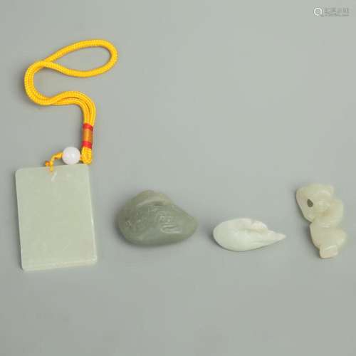 GROUP OF FOUR JADE PENDANT