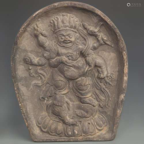 A FINE TERRACOTTA CARVED MAHAKALA STATUE