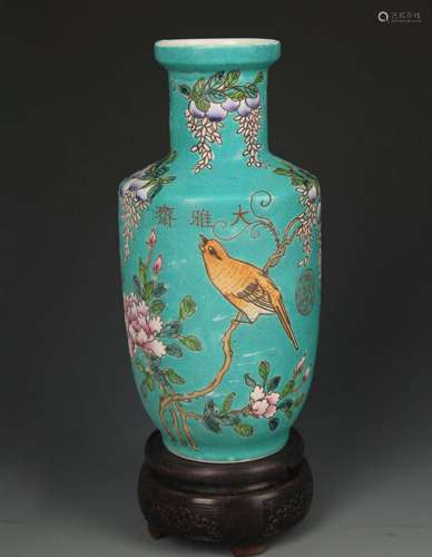 A TURQUOISE COLOR GROUND FAMILLE ROSE VASE