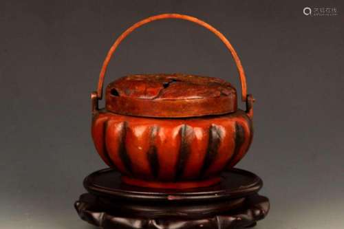 A FINE LOTUS SHAPED BRONZE CARRYING STOVE
