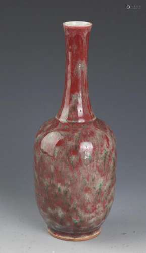 A RED GLAZED LONG NECK PORCELAIN BOTTLE