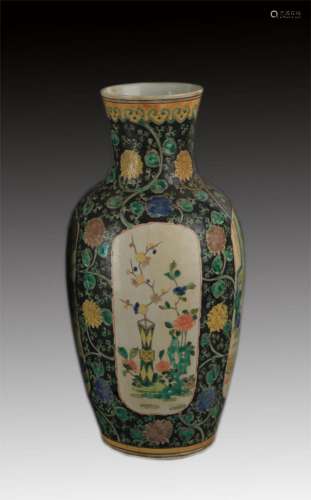 A BLACK GROUND FAMILLE ROSE PORCELAIN VASE