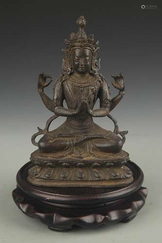 A FINE BRONZE FOUR ARM GUAN YIN STATUE