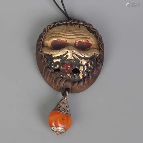 A FINE TIBETAN BUDDHISM PENDANT