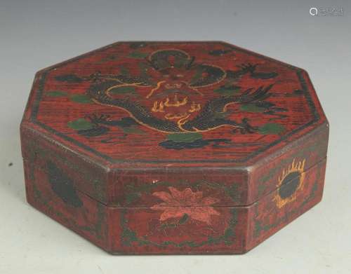 A GILT LACQUERED WOOD DRAGON PAINTED EIGHT SIDE BOX