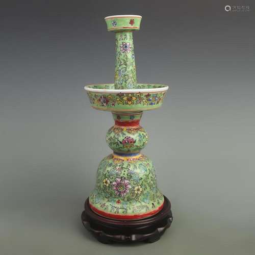 A GREEN GROUND FLOWER PATTERN PORCELAIN CANDLESTICKS