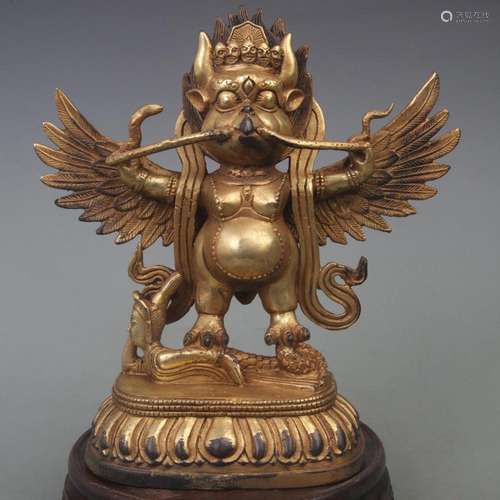 A FINE BRONZE TIBETAN GARUDA STATUE