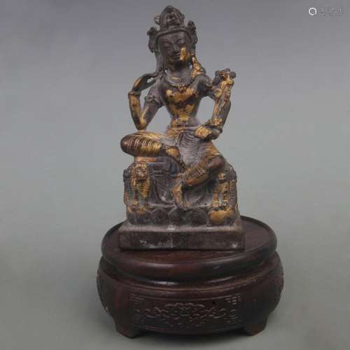 A GILT BRONZE GUAN YIN STATUE