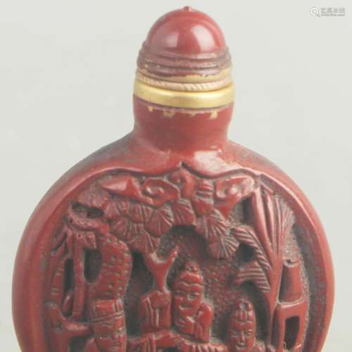 A FINE CARVED LACQUER CHARACTER FIGURE SNUFF BOTTLE