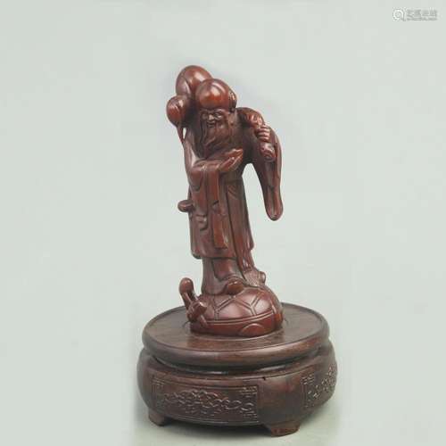 A FINE BOXWOOD MADE LONGEVITY GOD FIGURE