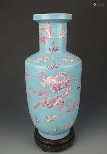 A LIGHT BLUE GROUND DRAGON PATTERN VASE