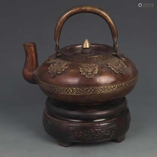 A FINE TIBETAN BUDDHIST FINELY CARVED BRONZE EWER