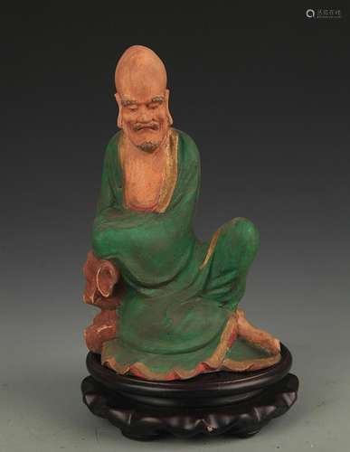 A COLORED WOODEN BODHIDHARMA FIGURE