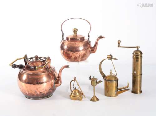 Two small red copper water kettles