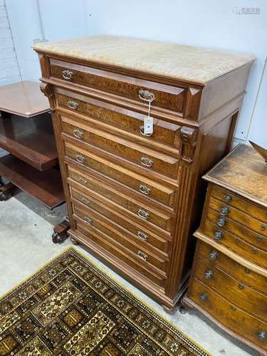 An early 20th century French marble topped eight drawer tall...