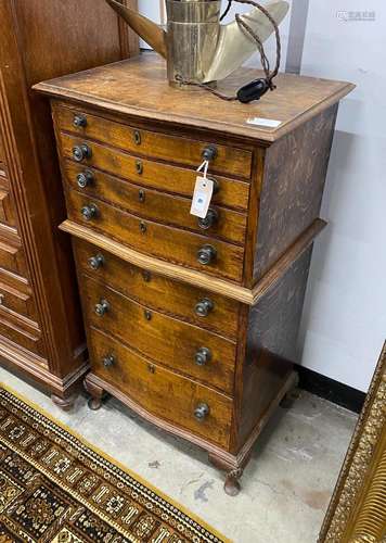 An early 20th century serpentine front oak canteen chest, wi...