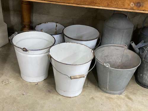 Ten galvanised and enamelled buckets, watering cans and feed...