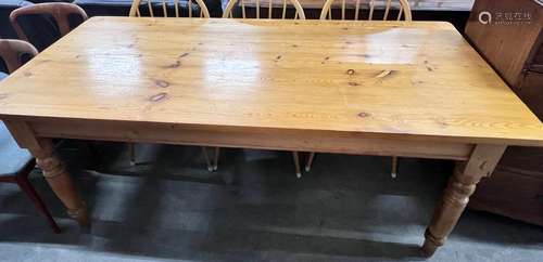 A Victorian style rectangular pine kitchen table, length 183...